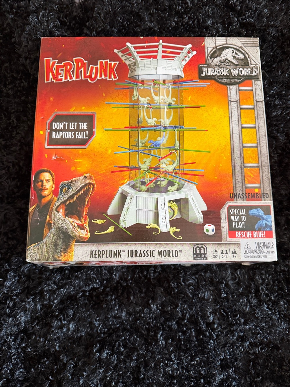 Mattel Jurassic World KerPlunk Game - Orange and Red Box